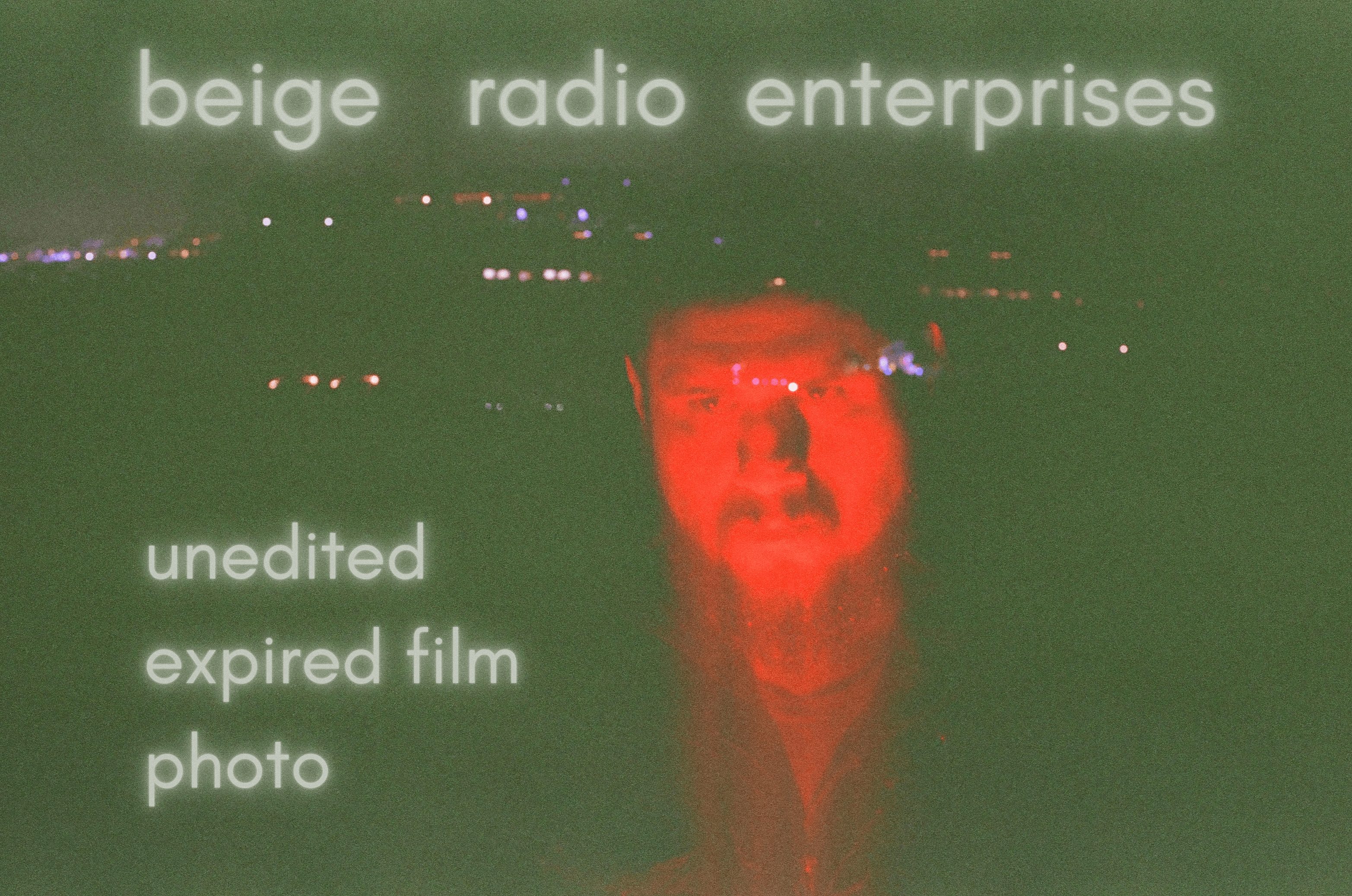 Nighttime scene with a person's face reflected on water, text overlay includes 'beige radio enterprises' and film details.