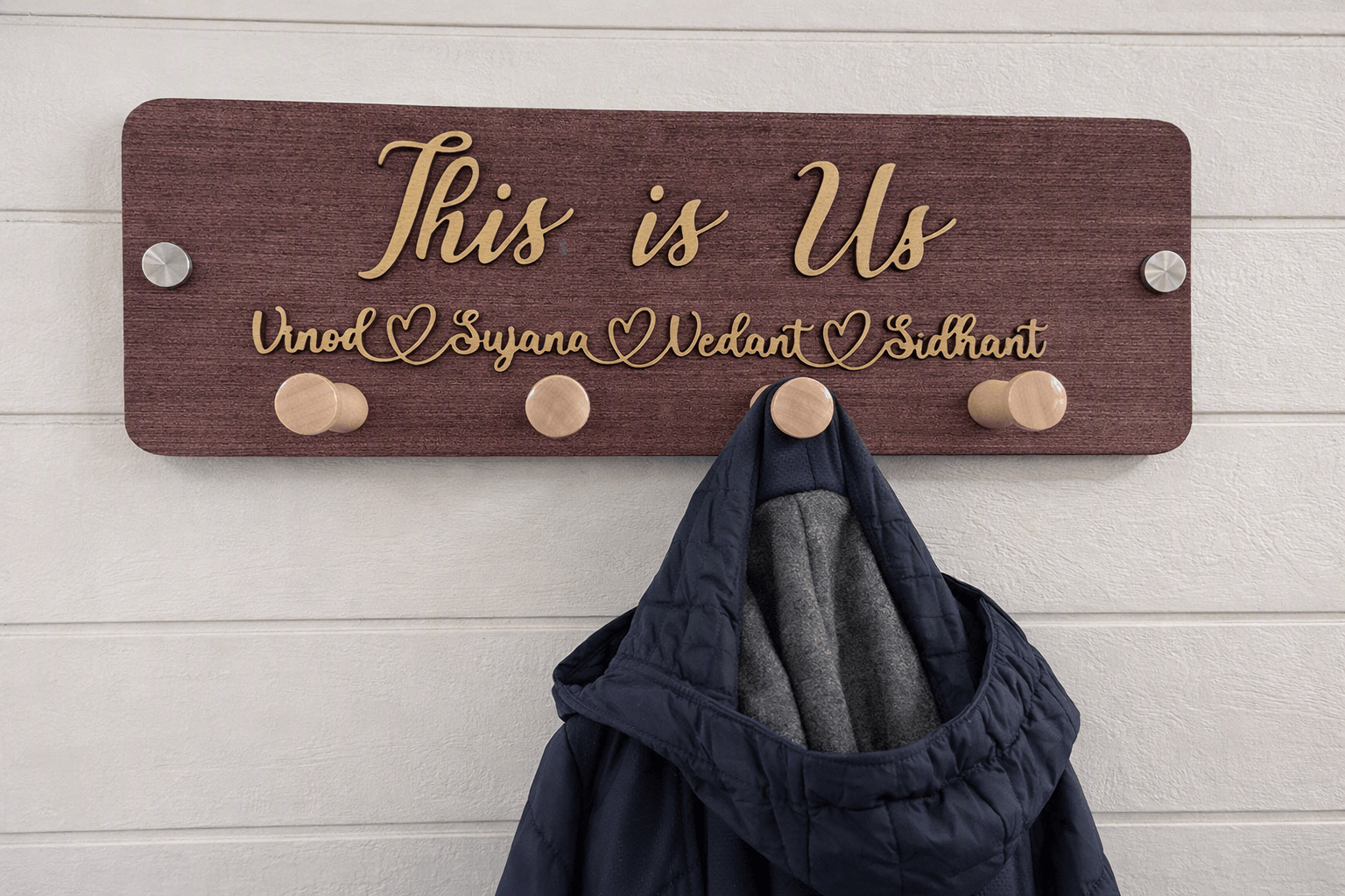 Wooden sign with gold lettering reading 