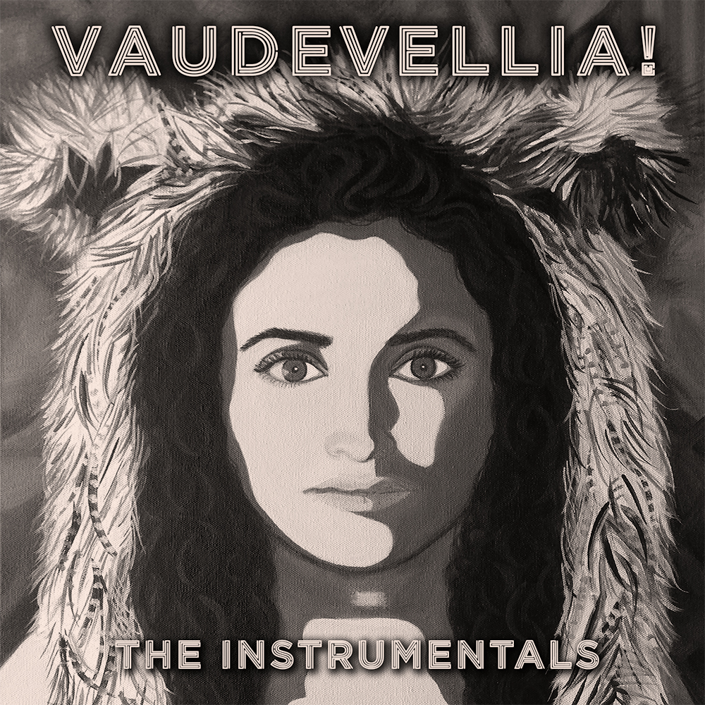 A black and white illustration of a woman with long hair, wearing a lion headdress, with text 'VAUDEVELLIA! THE INSTRUMENTALS'.
