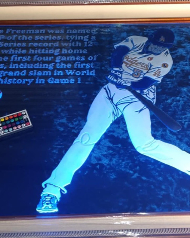 Illustration of a baseball player swinging a bat, with text and a color palette nearby, in blue tones.