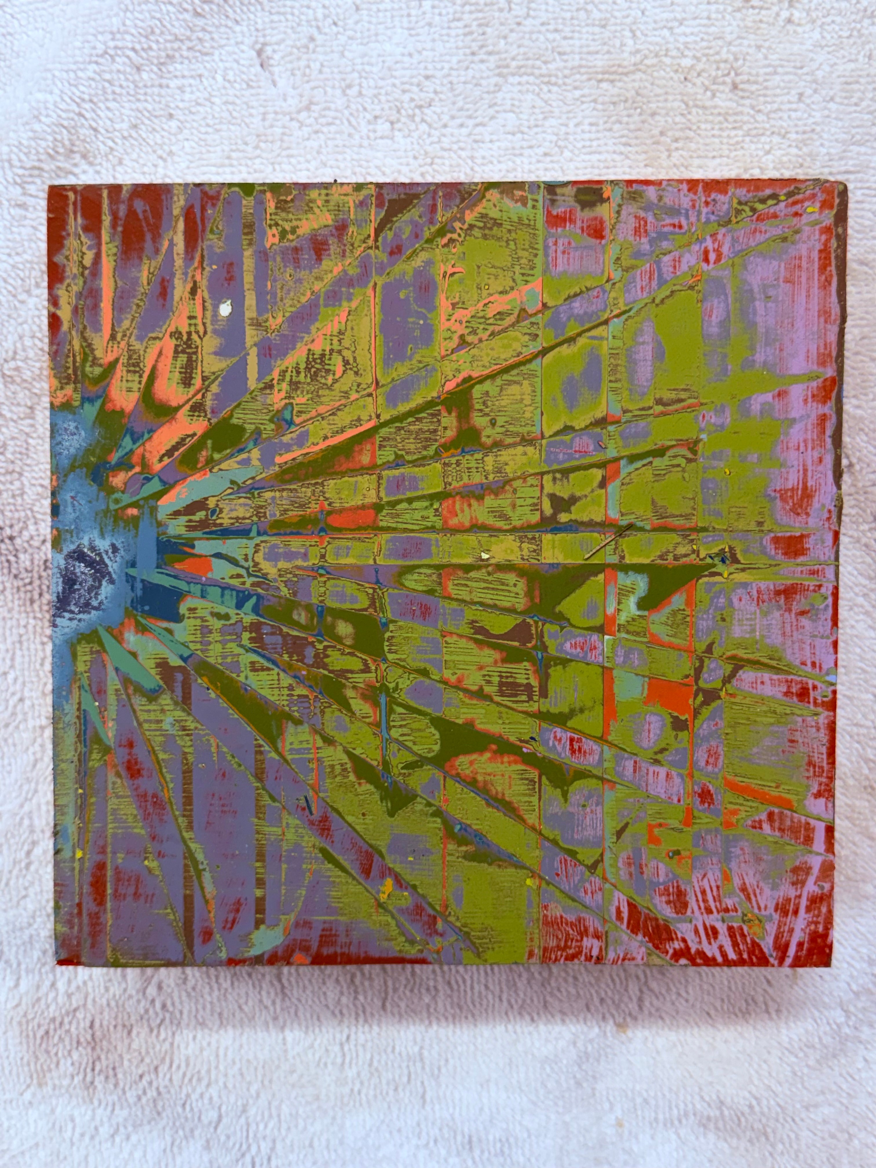 Abstract painting with colorful lines and shapes on a textured background.